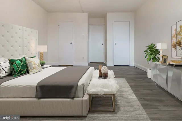 a bed room with a bed and a couch