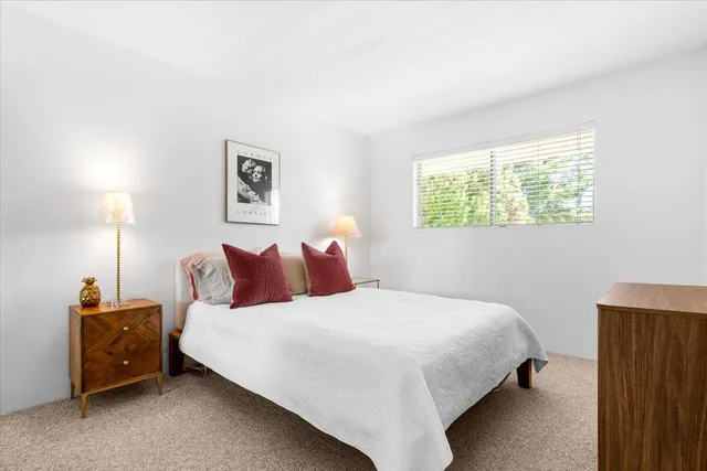 a view of balcony with yard and outdoor seating