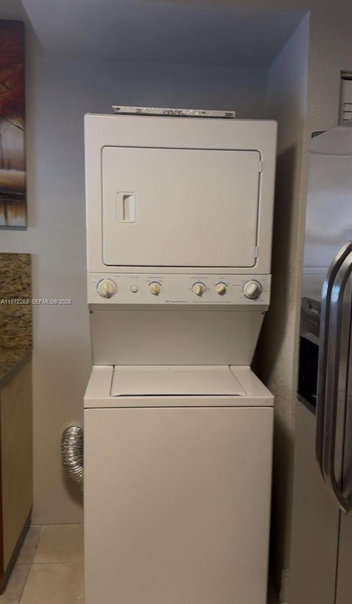 15445 Southwest 57th Street Miami, FL 33193 - Photo 48 of 78 a utility room with dryer and washer