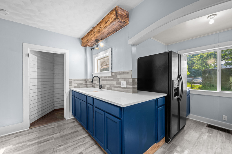 1419 17th Street Moline, IL 61265 - Photo 18 of 28 a kitchen with a sink appliances and cabinets