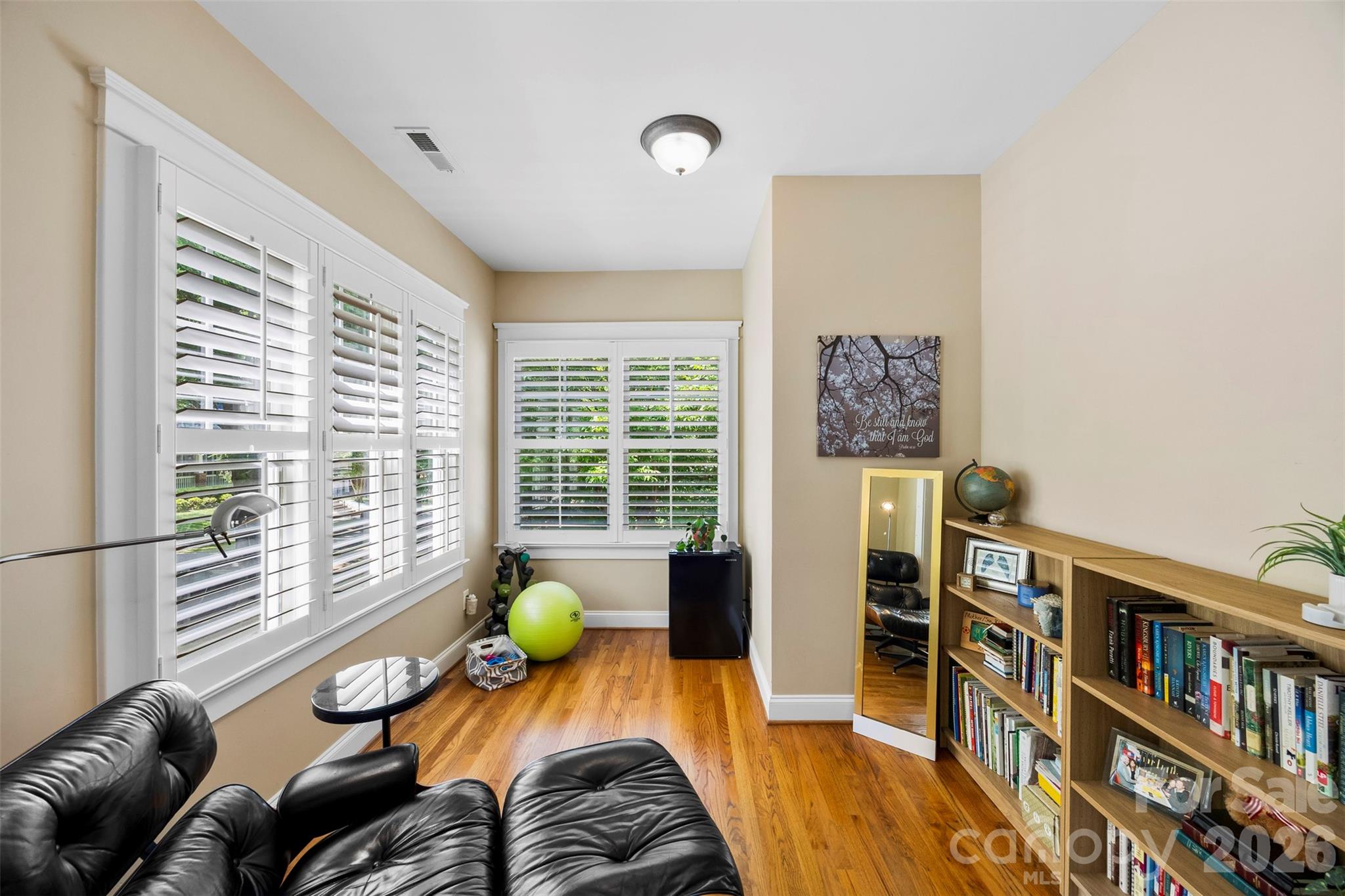606 Andover Lane Tega Cay, SC 29708 - Photo 22 of 48 a living room with furniture and a book shelf