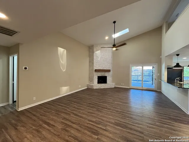 a view of a room that has a window in it