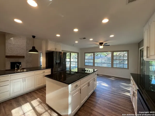 a bathroom with a toilet and a mirror