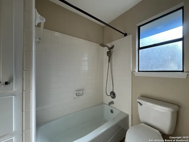 a view of balcony with wooden floor