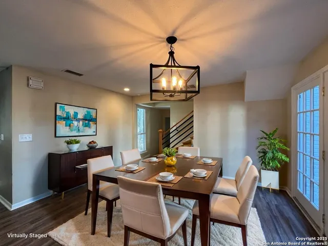 a bedroom with a bed couch and window