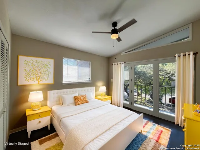 a kitchen with granite countertop a sink a stove and cabinets