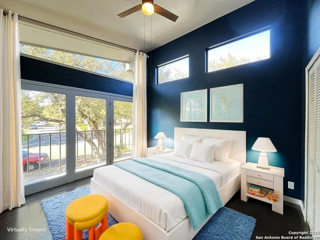 a kitchen with stainless steel appliances kitchen island granite countertop a stove a sink and a refrigerator