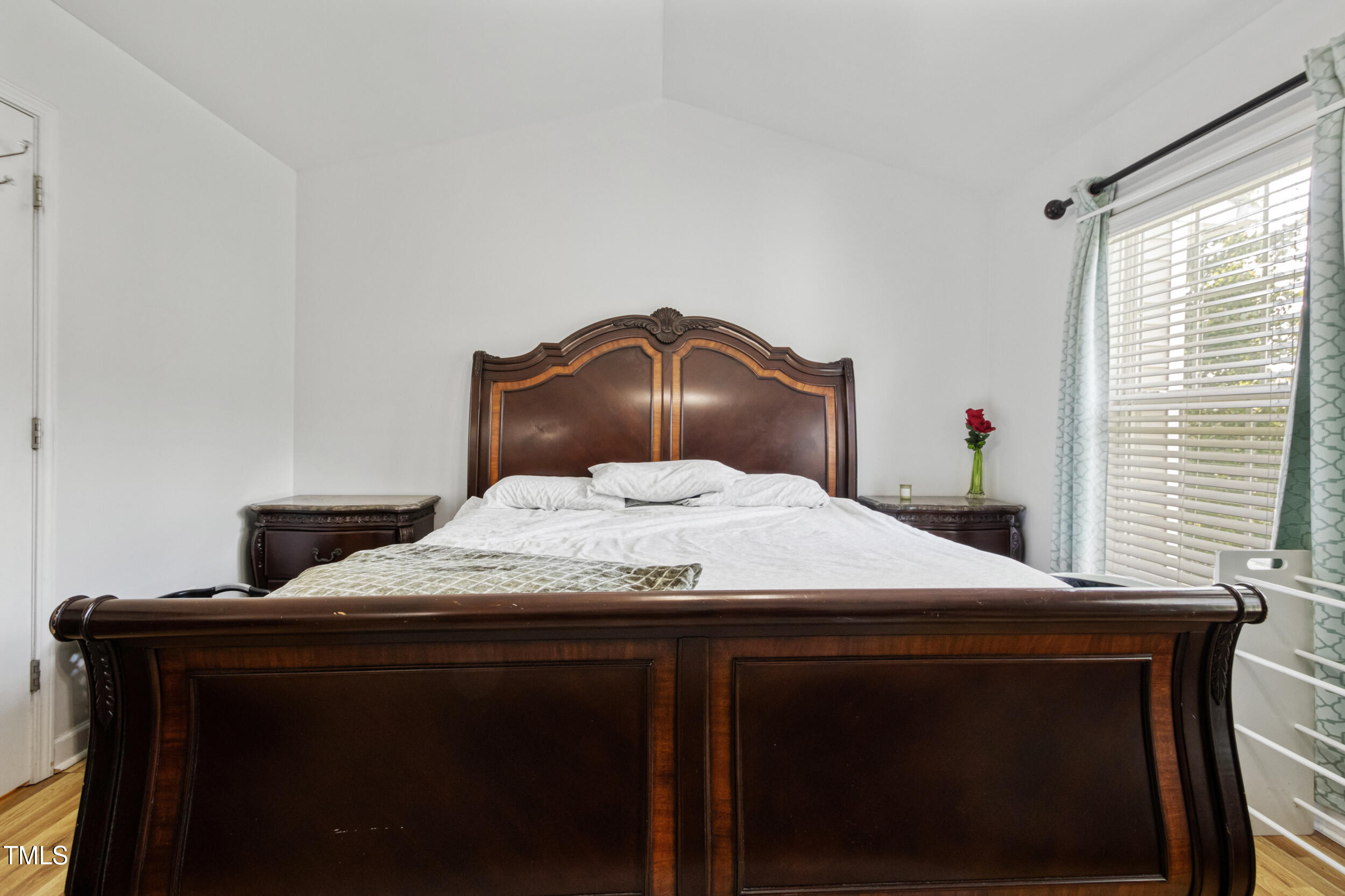 6113 Neuse Wood Drive Raleigh, NC 27616 - Photo 18 of 29 a kitchen with a stove a counter top space and a window