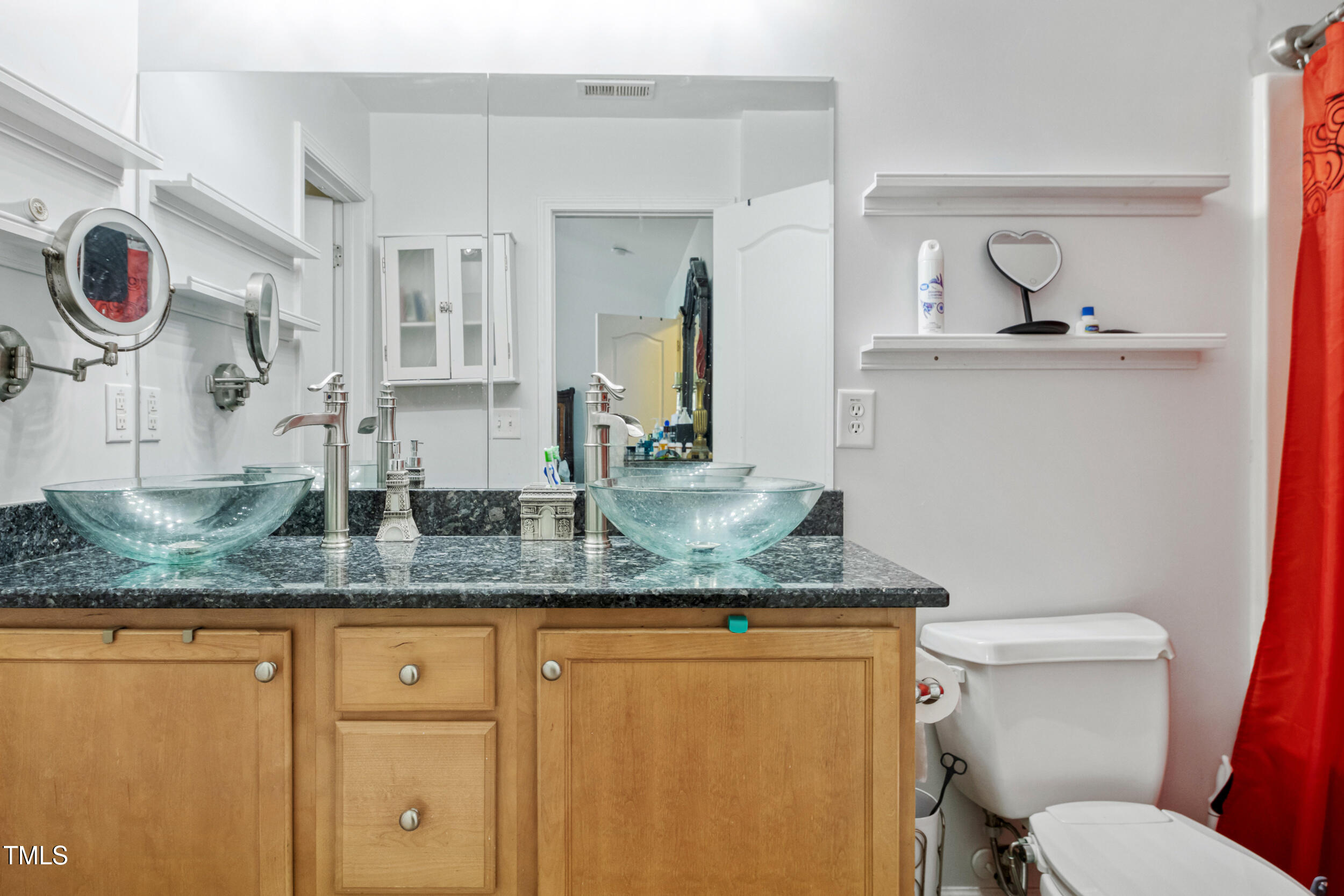 6113 Neuse Wood Drive Raleigh, NC 27616 - Photo 20 of 29 a bathroom with a granite countertop sink and a mirror