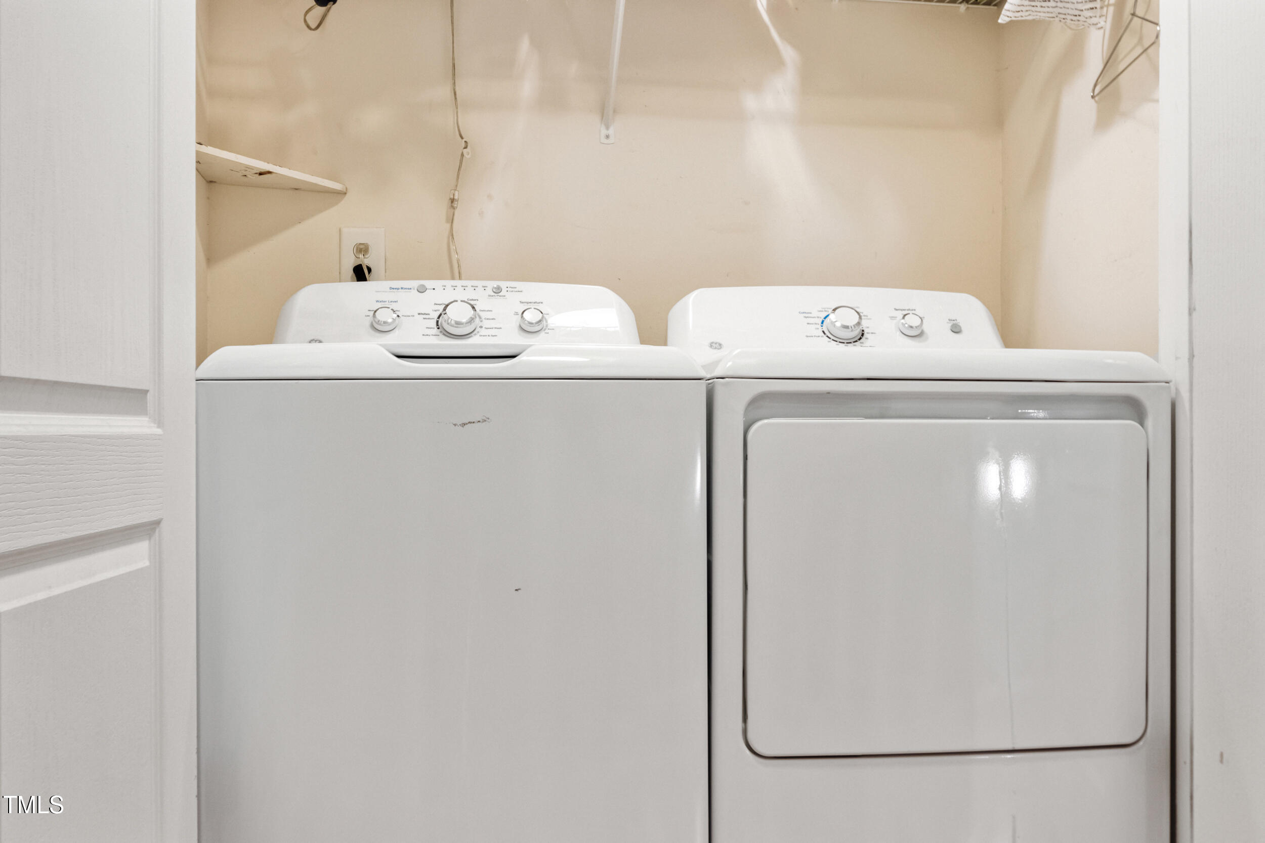 6113 Neuse Wood Drive Raleigh, NC 27616 - Photo 25 of 29 a utility room with dryer and washer