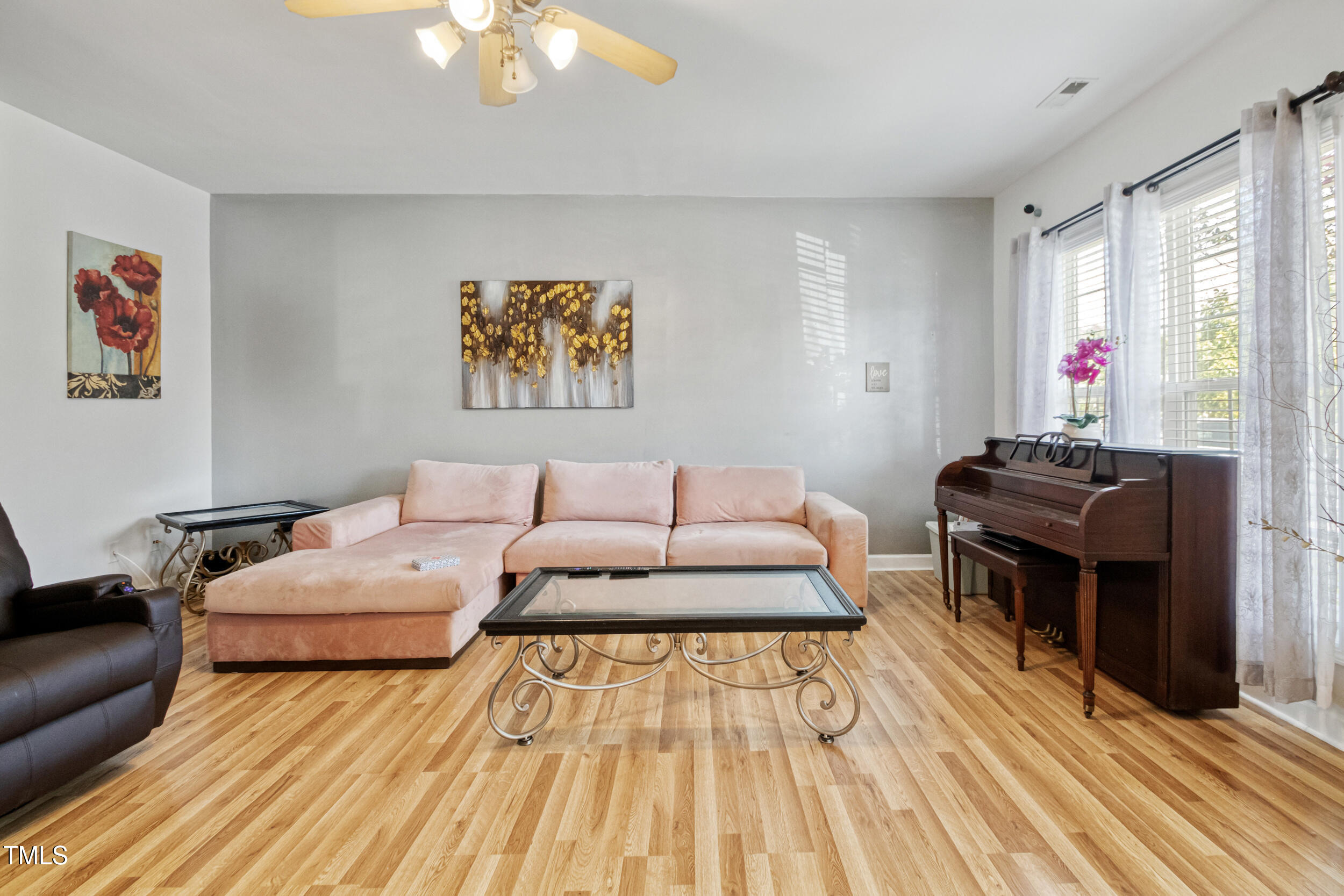 6113 Neuse Wood Drive Raleigh, NC 27616 - Photo 6 of 29 a living room with furniture and a wooden floor