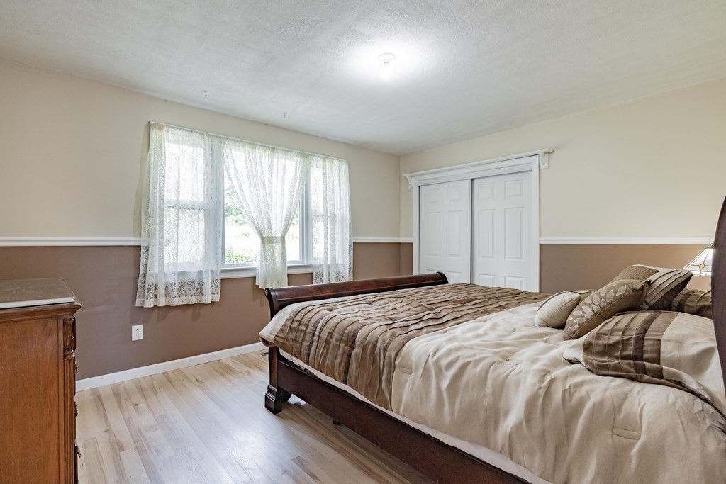 146 Bromley Road Chester, MA 01050 - Photo 13 of 40 a bedroom with a bed and a window
