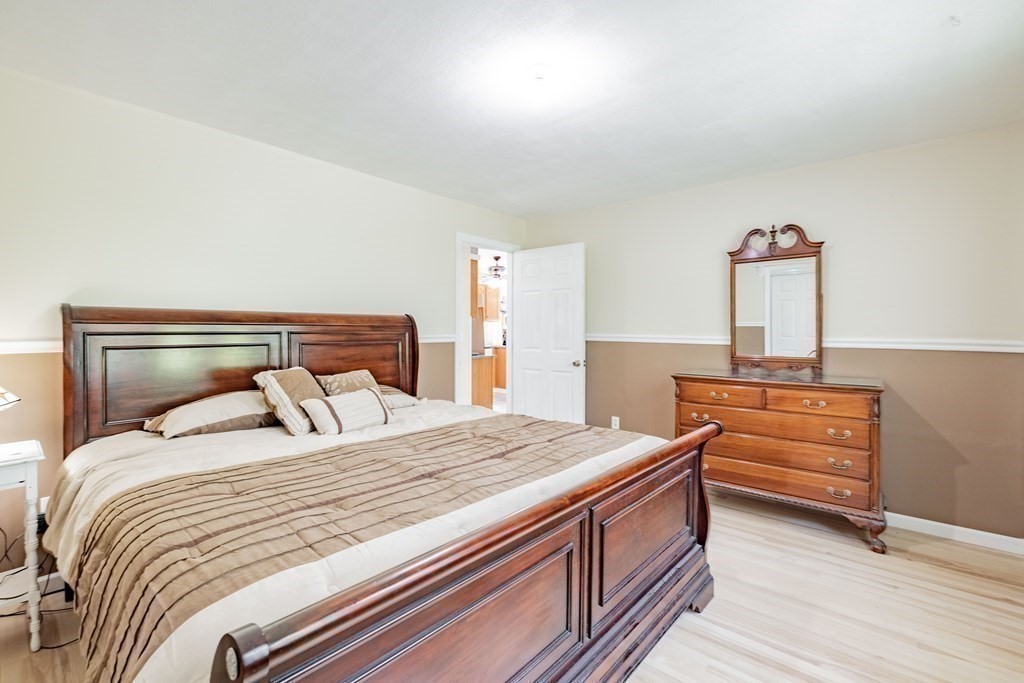 146 Bromley Road Chester, MA 01050 - Photo 16 of 40 a bedroom with a bed and a dresser