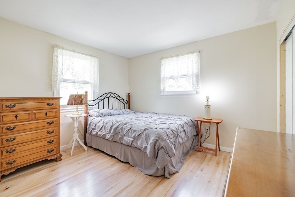 146 Bromley Road Chester, MA 01050 - Photo 17 of 40 a bedroom with a bed and a window