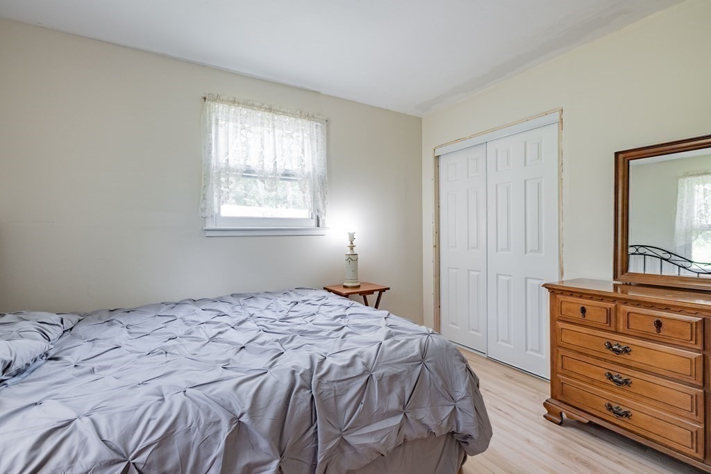 146 Bromley Road Chester, MA 01050 - Photo 18 of 40 a bedroom with a bed and a dresser