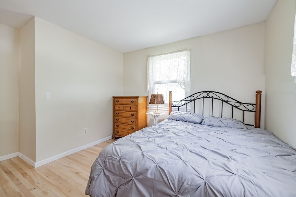 146 Bromley Road Chester, MA 01050 - Photo 19 of 40 a bedroom with a bed and a window