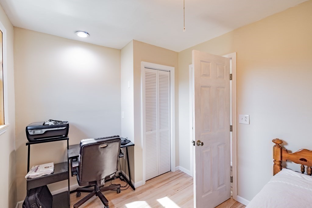146 Bromley Road Chester, MA 01050 - Photo 21 of 40 a view of a workspace with furniture and wooden floor