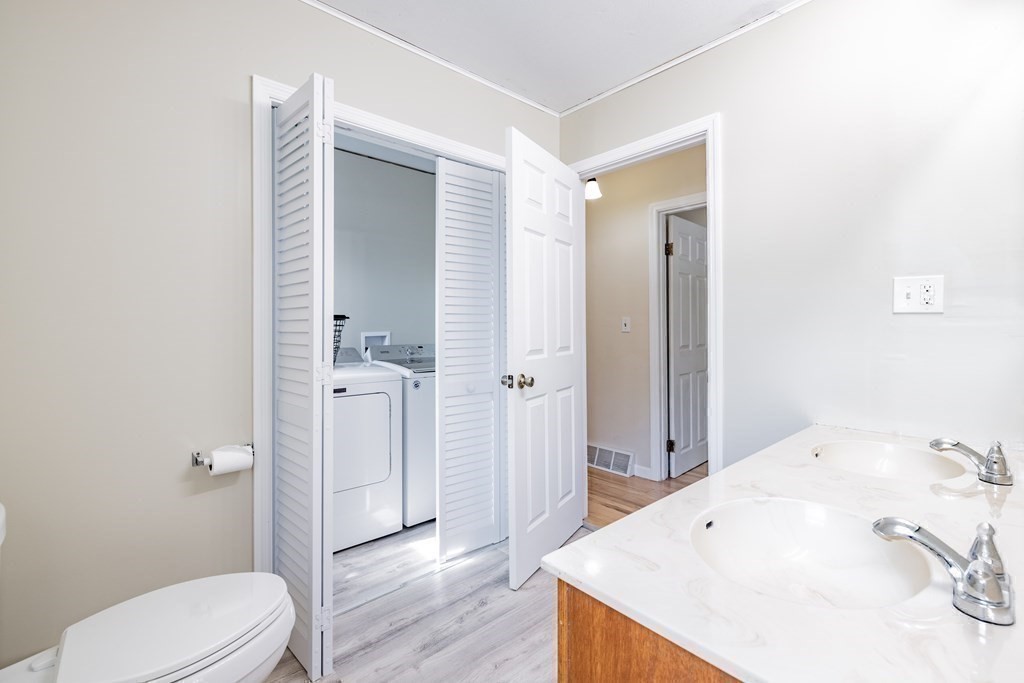 146 Bromley Road Chester, MA 01050 - Photo 23 of 40 a bathroom with a granite countertop sink toilet and shower