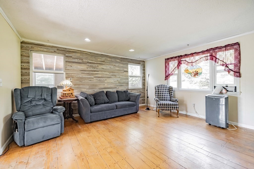 146 Bromley Road Chester, MA 01050 - Photo 5 of 40 a living room with furniture and large windows