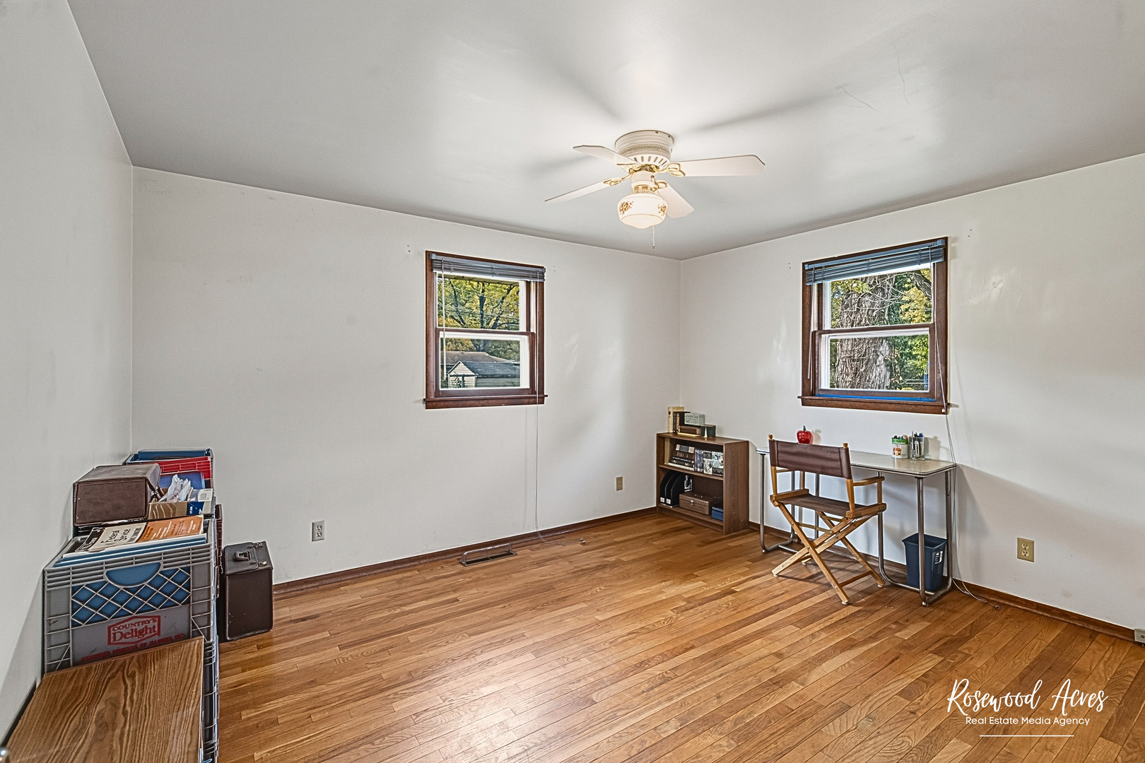 2308 1500 South Kankakee, IL 60901 - Photo 11 of 22 a view of a workspace with wooden floor and a window