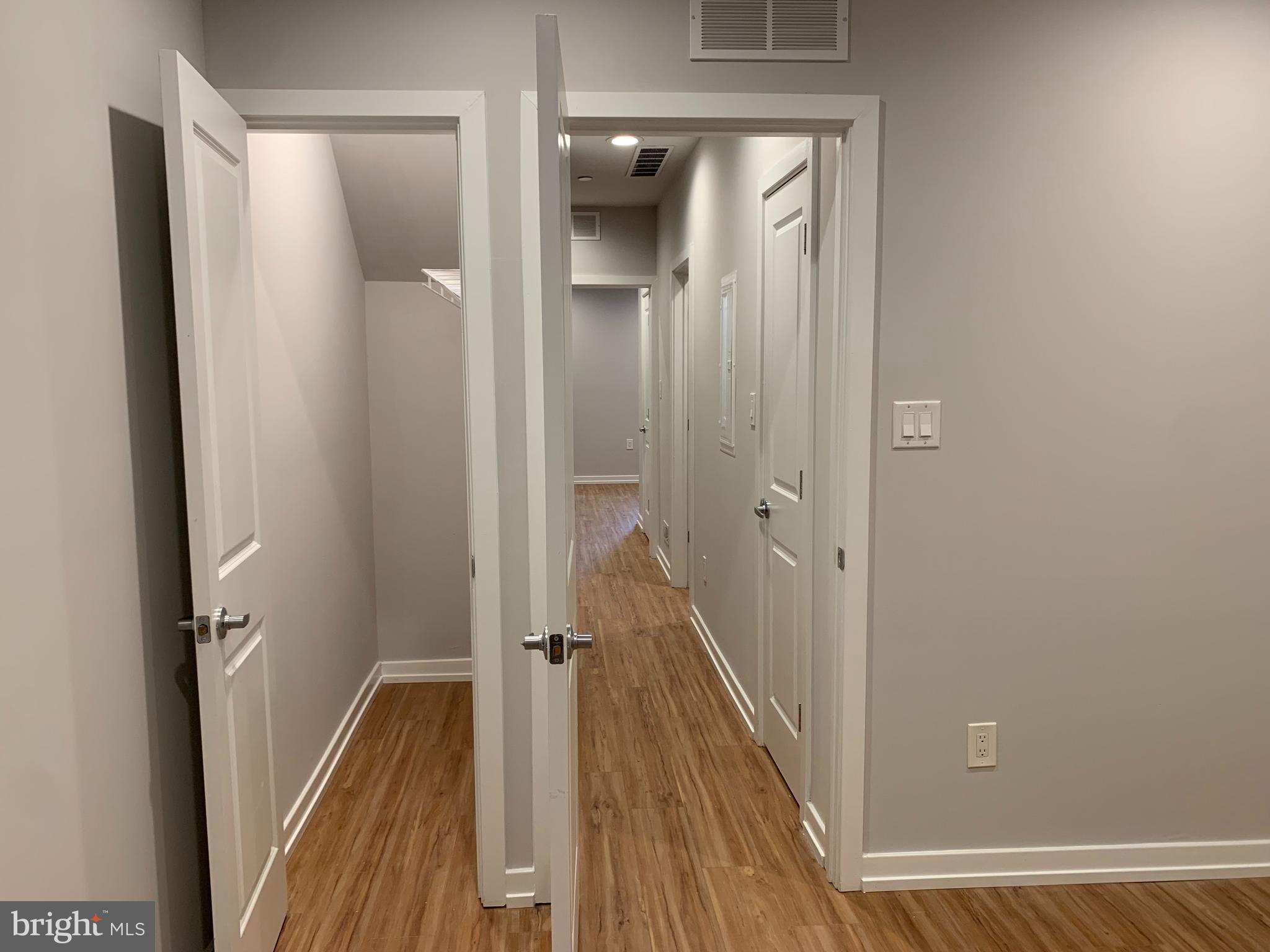 1268 South 27th Street, Unit 1 Philadelphia, PA 19146 - Photo 23 of 26 a view of a bathroom from a hallway