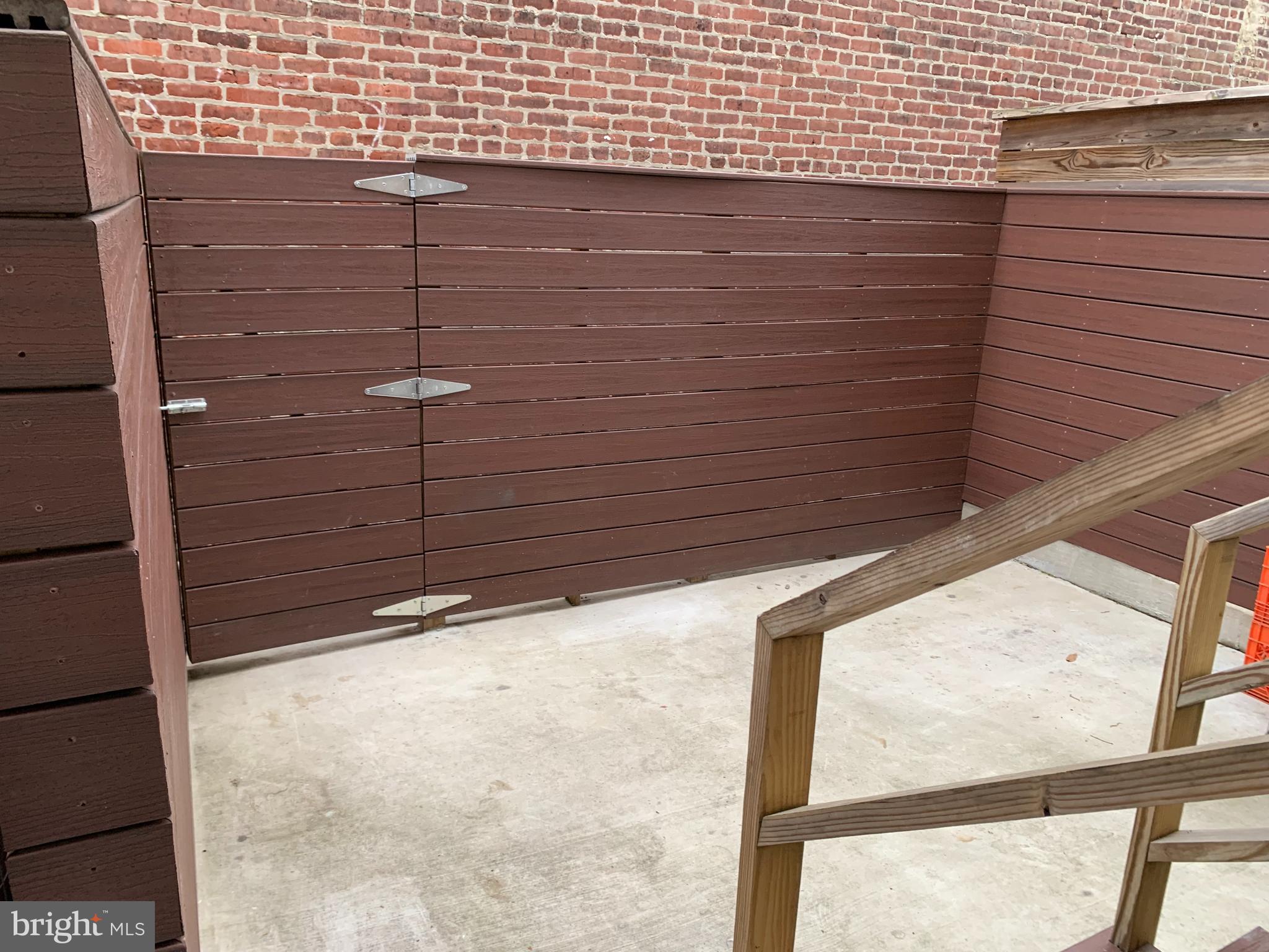1268 South 27th Street, Unit 1 Philadelphia, PA 19146 - Photo 9 of 26 a view of a door and wooden floor