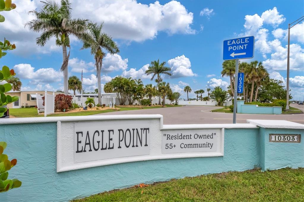 10303 Burnt Store Road, Unit 5 Punta Gorda, FL 33950 - Photo 2 of 49 a sign that is on a street next to a building