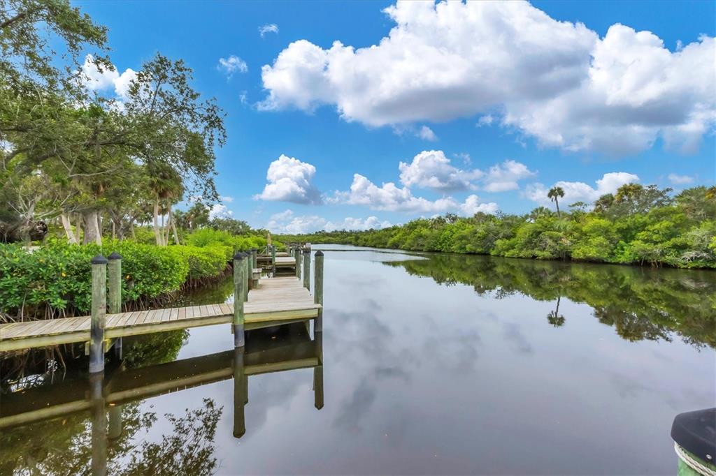 10303 Burnt Store Road, Unit 5 Punta Gorda, FL 33950 - Photo 48 of 49 a view of a lake from a balcony