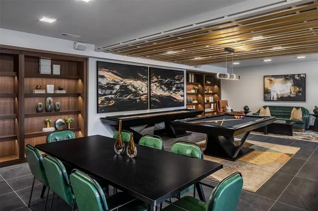 a lobby with furniture and window