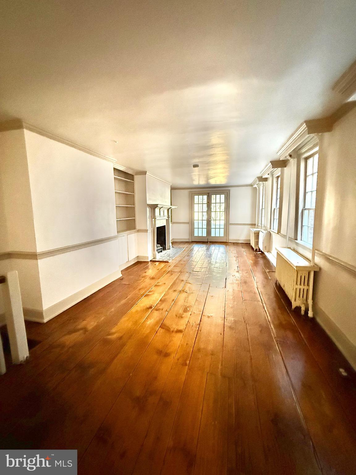 119 Prince Street, Unit 1 Alexandria, VA 22314 - Photo 12 of 29 a view of empty room with wooden floor