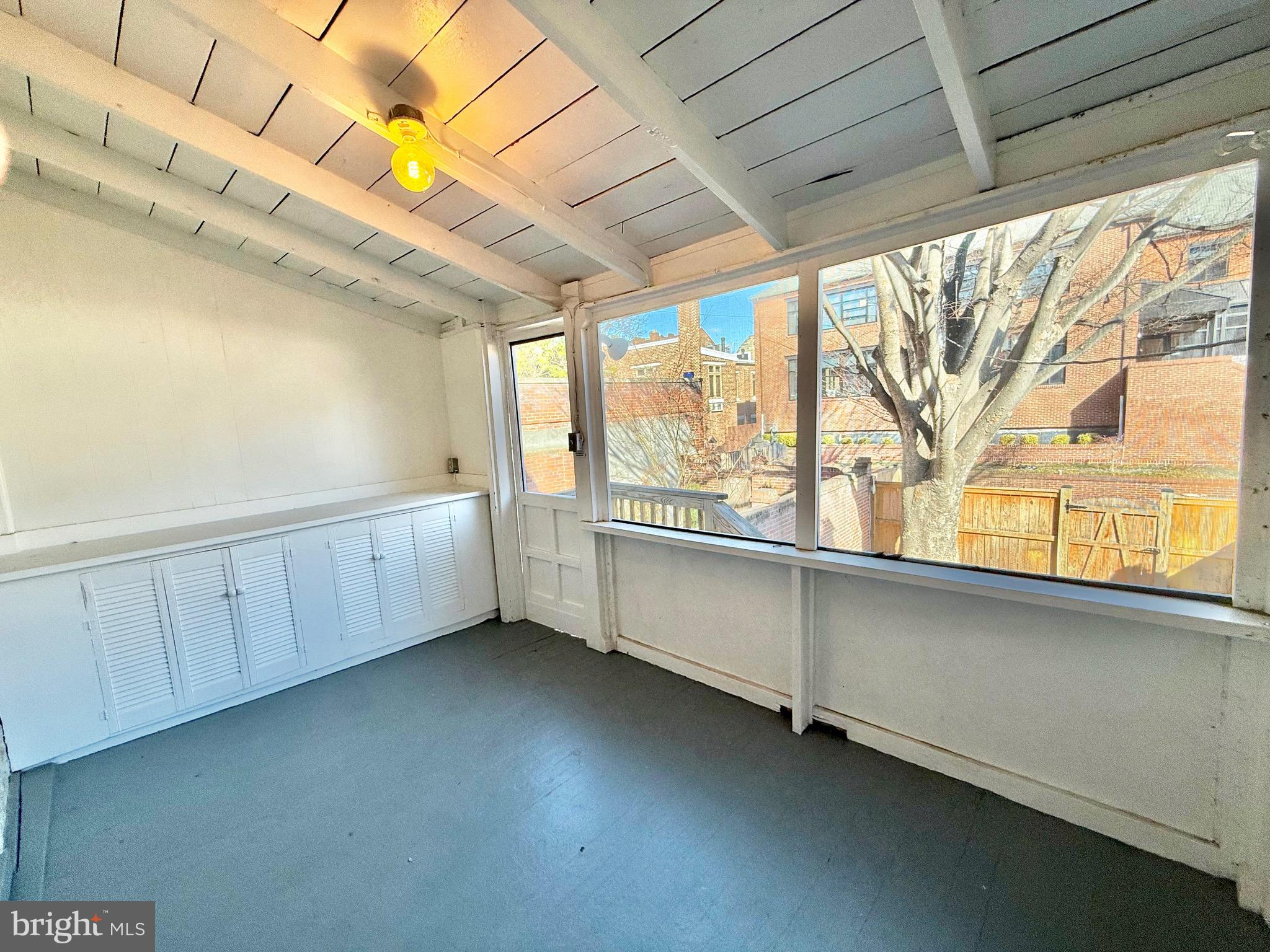 119 Prince Street, Unit 1 Alexandria, VA 22314 - Photo 15 of 29 a view of an empty room with a window