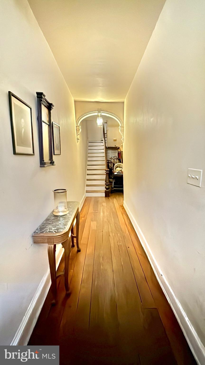 119 Prince Street, Unit 1 Alexandria, VA 22314 - Photo 22 of 29 a view of a livingroom with wooden floor
