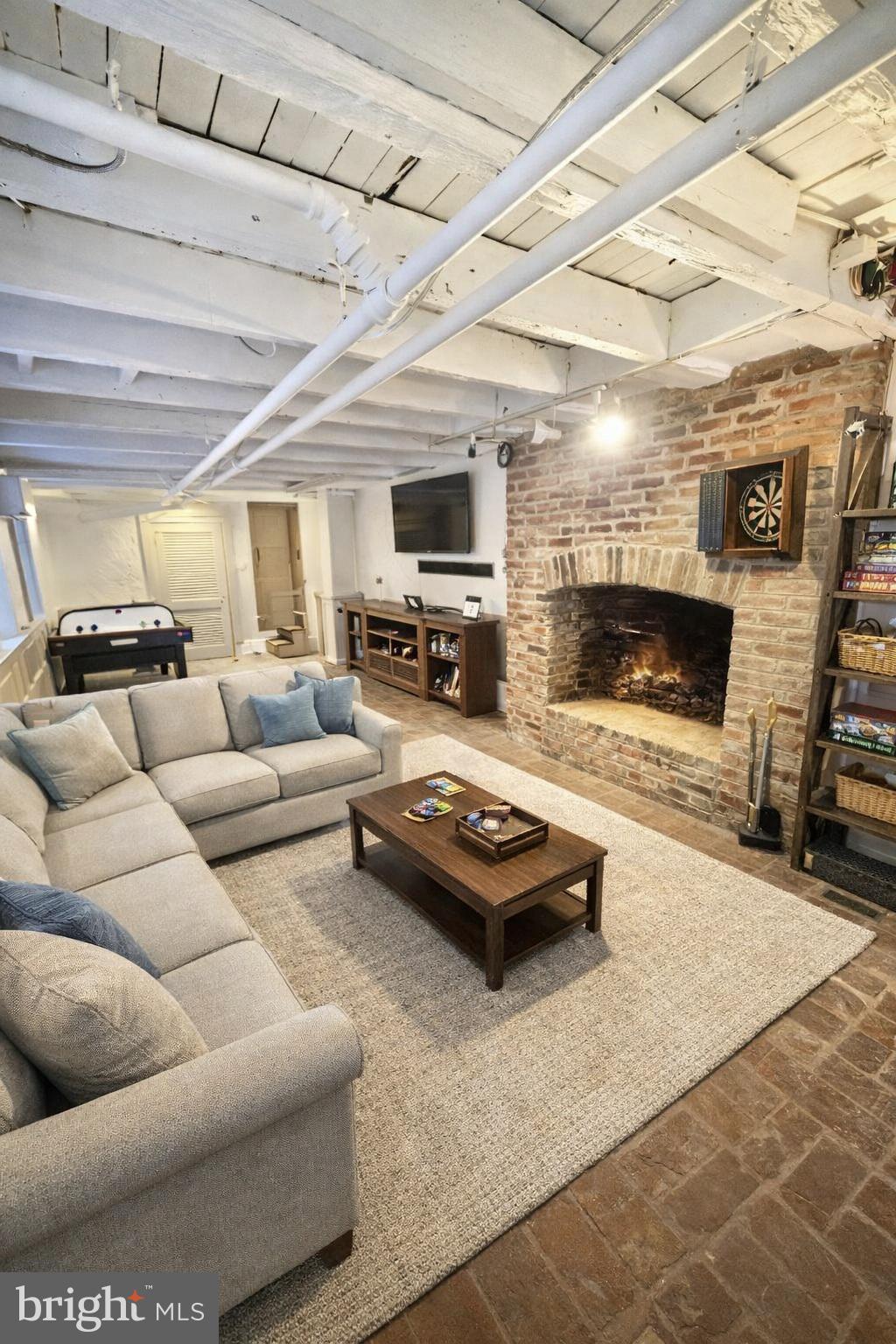 119 Prince Street, Unit 1 Alexandria, VA 22314 - Photo 3 of 29 a living room with furniture and a fireplace