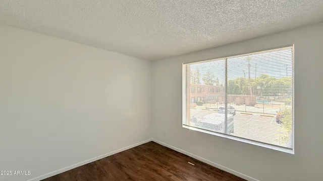 a view of a room that has a window in it