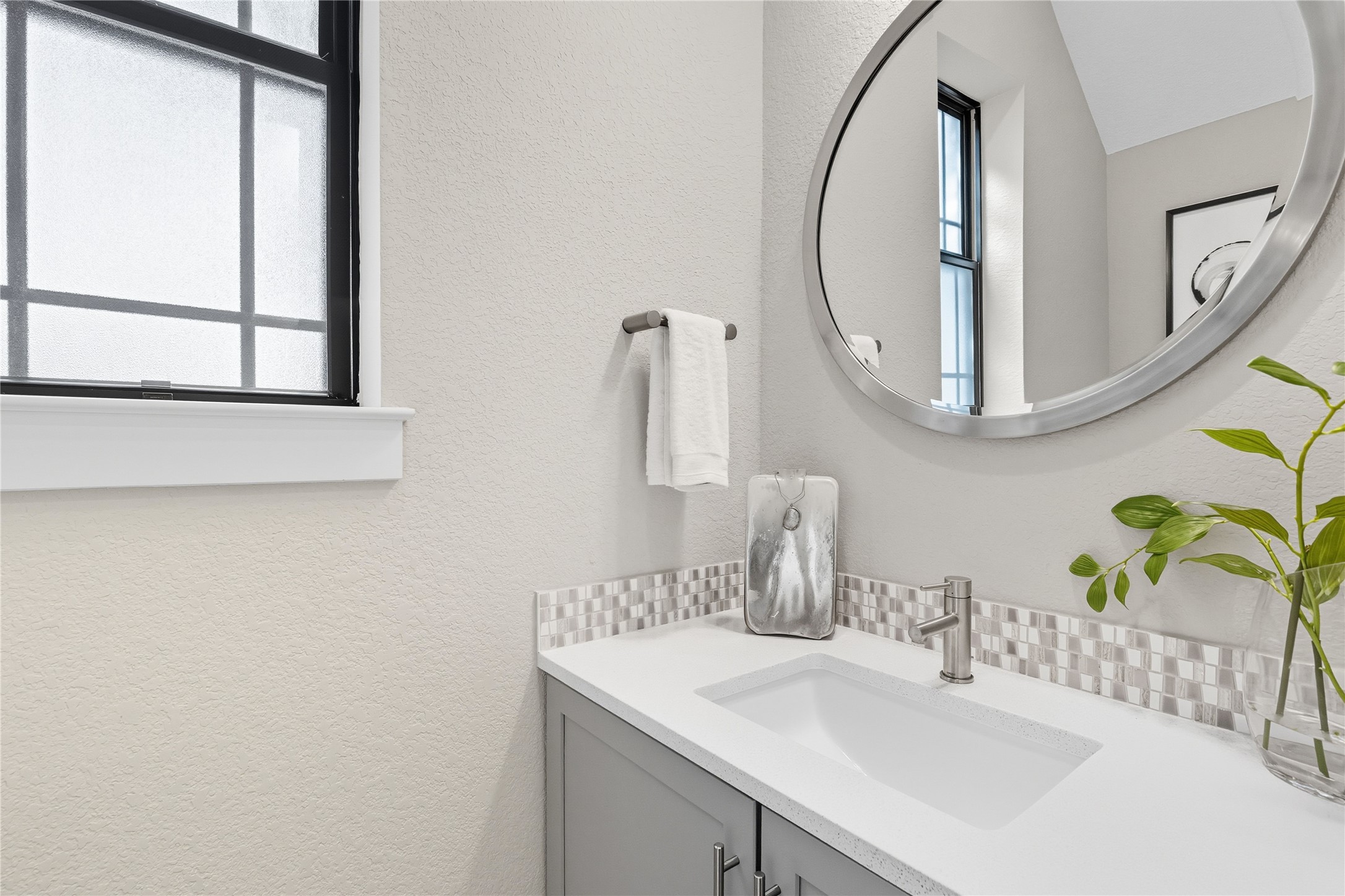 4323 Spicewood Springs Road, Unit 1 Austin, TX 78759 - Photo 18 of 35 a bathroom with a sink and a mirror