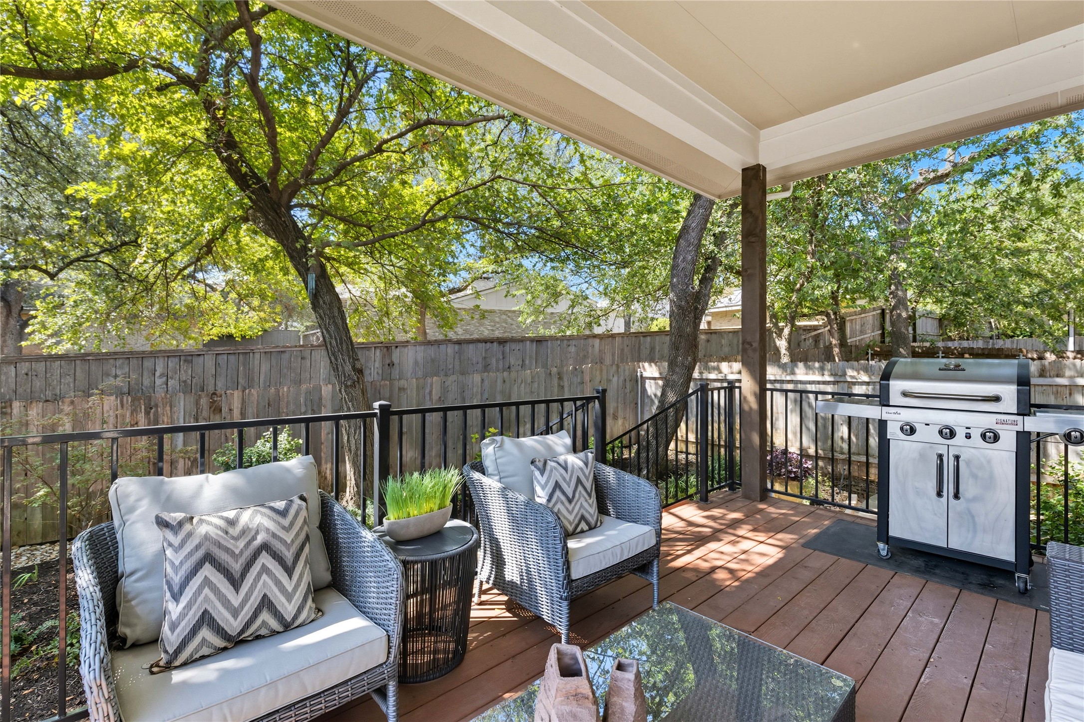 4323 Spicewood Springs Road, Unit 1 Austin, TX 78759 - Photo 19 of 35 a balcony with furniture and wooden floor