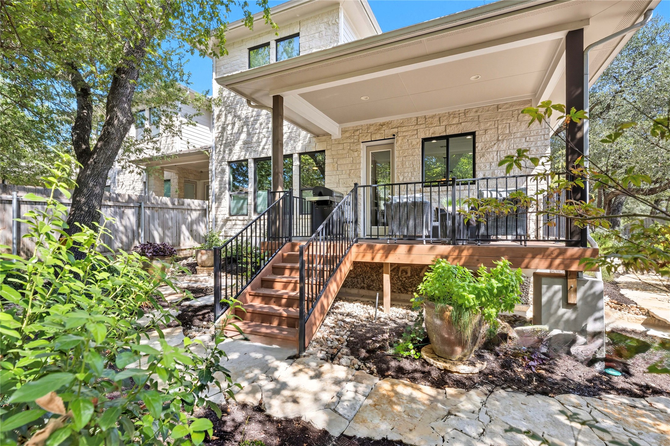 4323 Spicewood Springs Road, Unit 1 Austin, TX 78759 - Photo 22 of 35 a front view of a house with garden