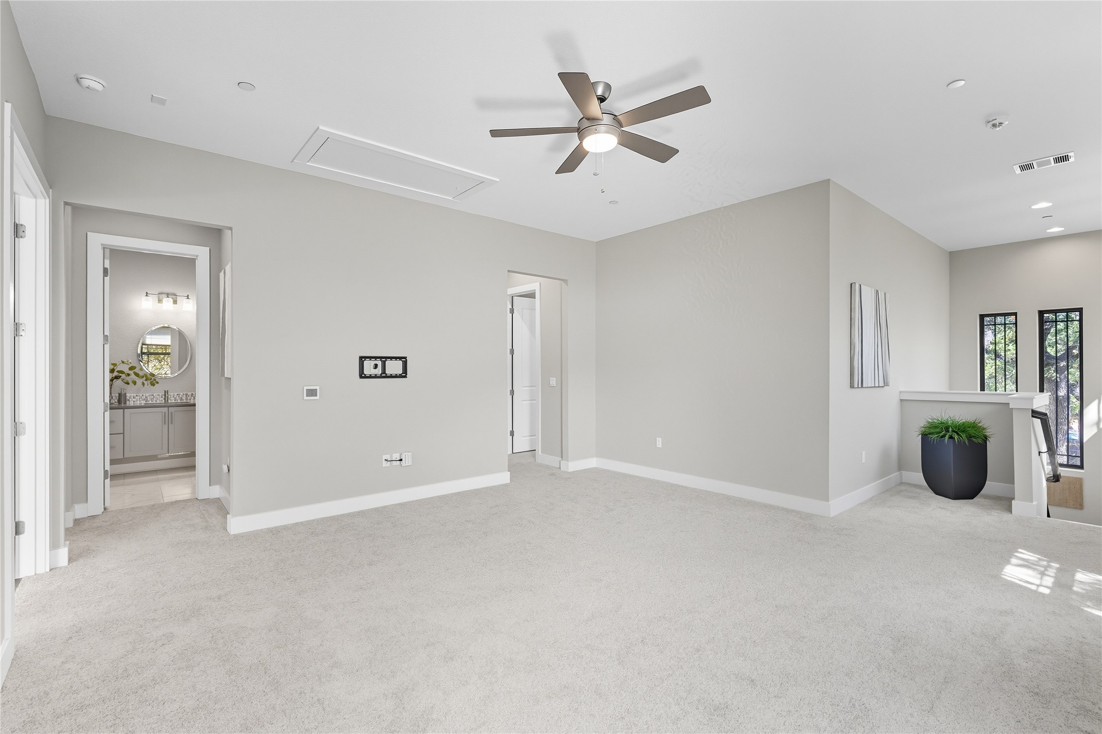 4323 Spicewood Springs Road, Unit 1 Austin, TX 78759 - Photo 23 of 35 an empty room with closet and windows