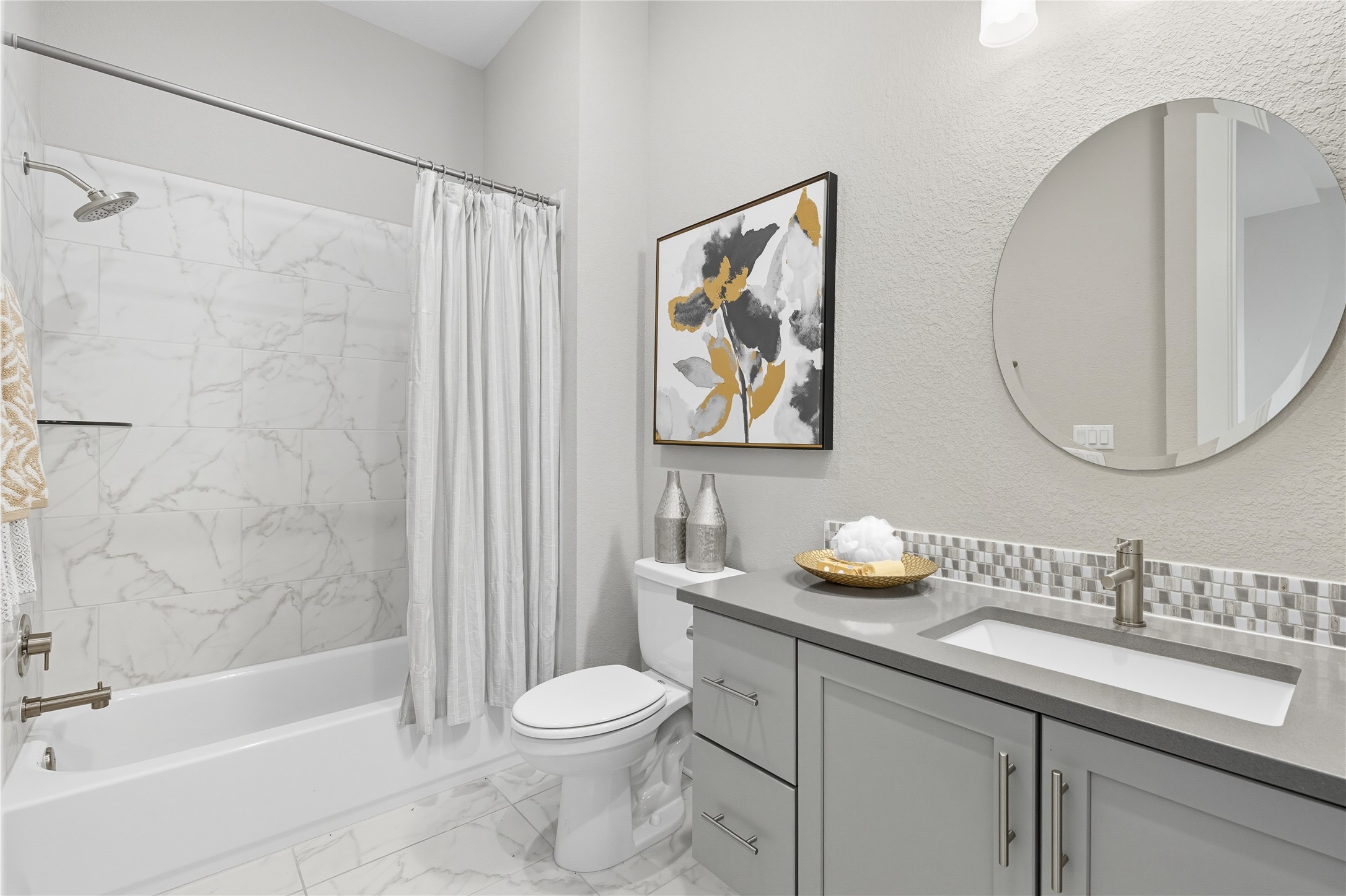 4323 Spicewood Springs Road, Unit 1 Austin, TX 78759 - Photo 26 of 35 a bathroom with a granite countertop sink a toilet and a bathtub