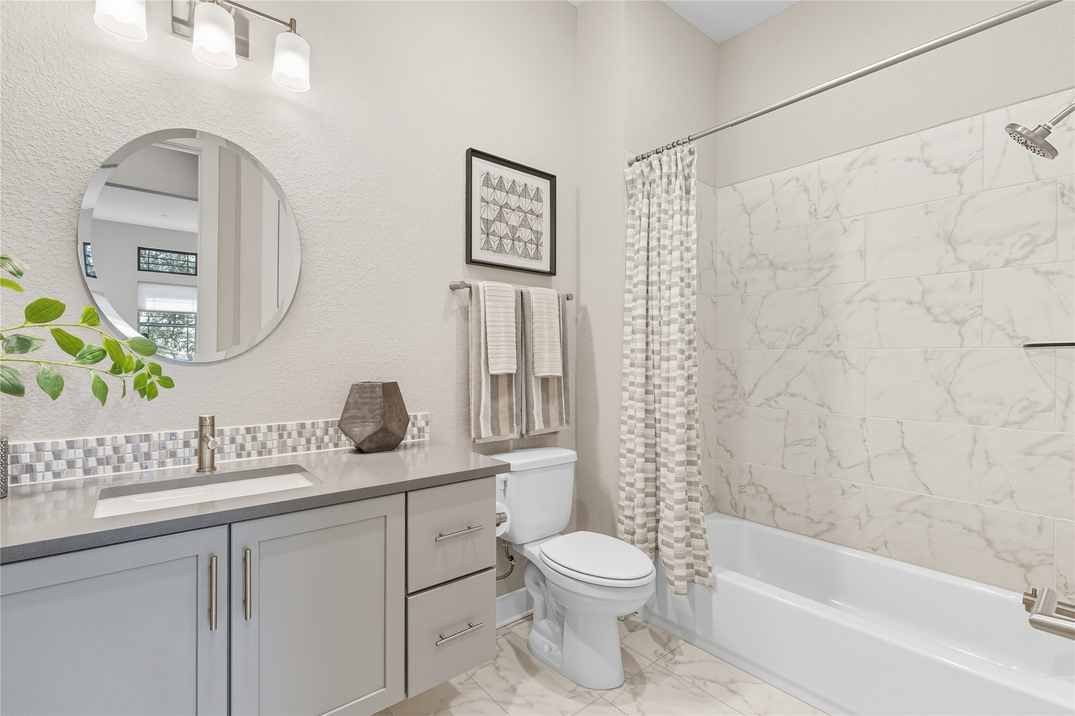 4323 Spicewood Springs Road, Unit 1 Austin, TX 78759 - Photo 30 of 35 a bathroom with a granite countertop toilet sink and a mirror