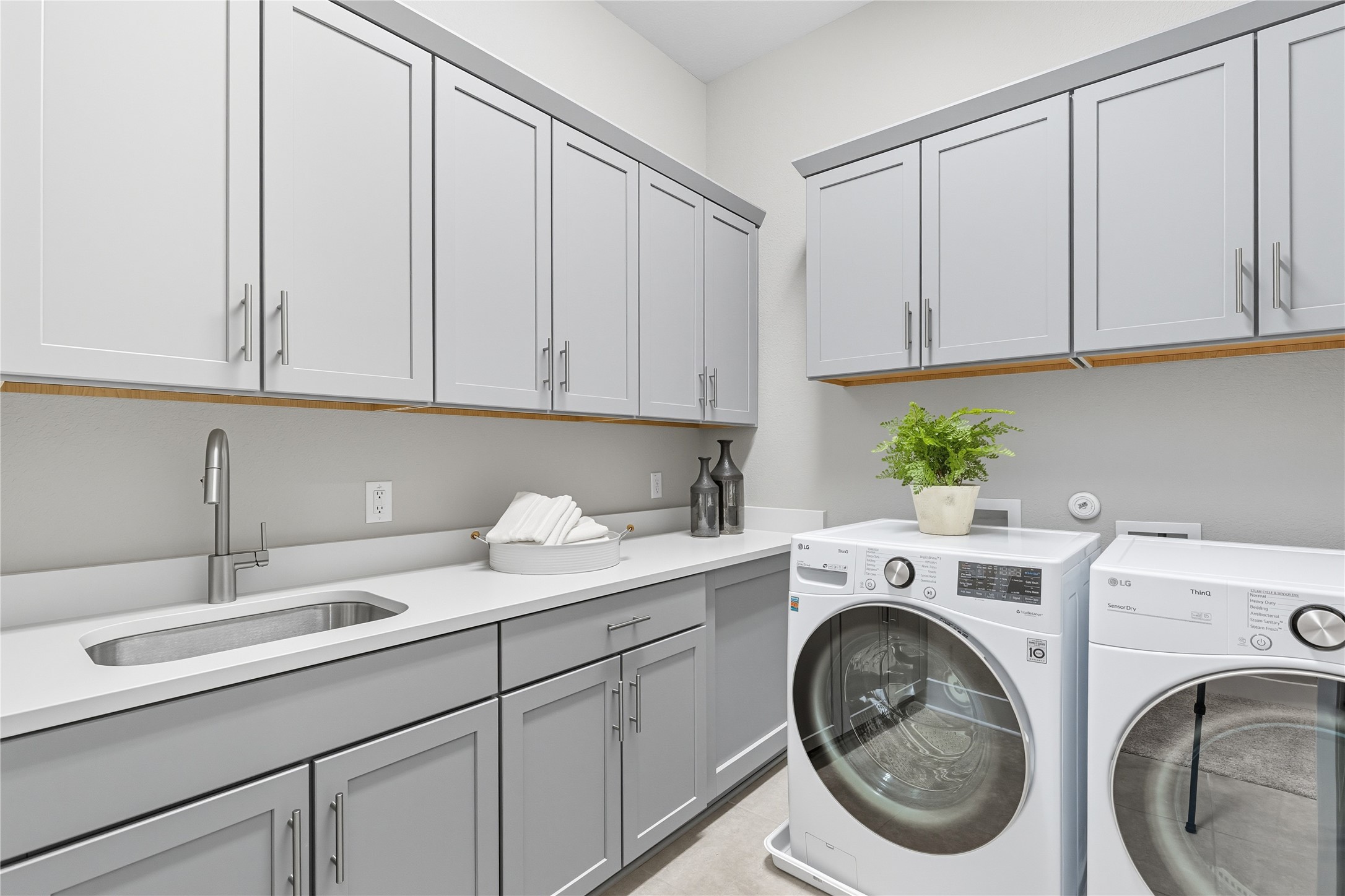 4323 Spicewood Springs Road, Unit 1 Austin, TX 78759 - Photo 31 of 35 a utility room with sink dryer and washer