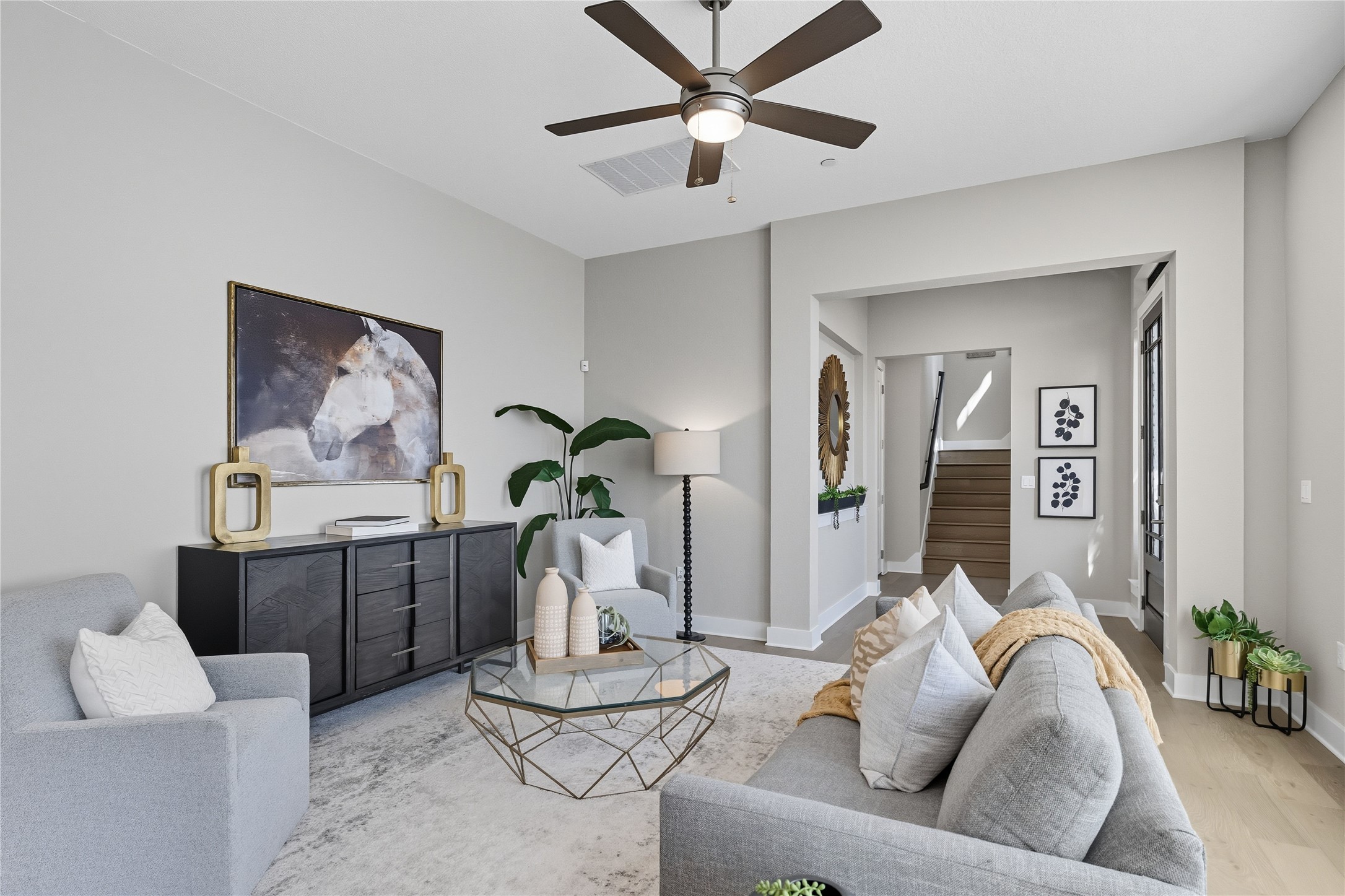 4323 Spicewood Springs Road, Unit 1 Austin, TX 78759 - Photo 7 of 35 a living room with furniture and a wooden floor
