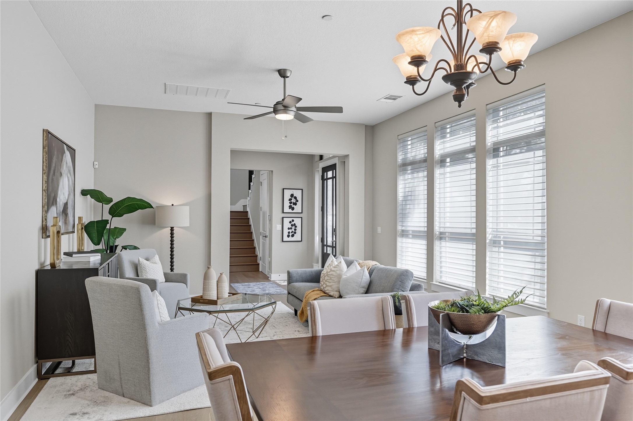 4323 Spicewood Springs Road, Unit 1 Austin, TX 78759 - Photo 9 of 35 a living room with furniture and a chandelier