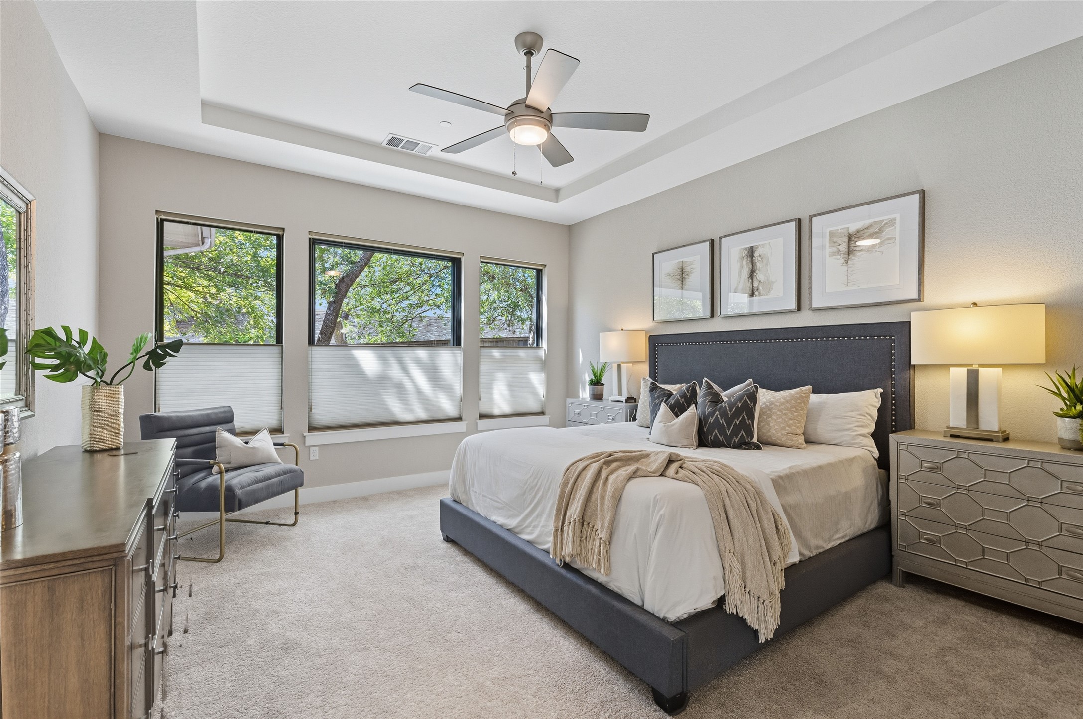 4323 Spicewood Springs Road, Unit 1 Austin, TX 78759 - Photo 10 of 35 a spacious bedroom with a bed and a large window