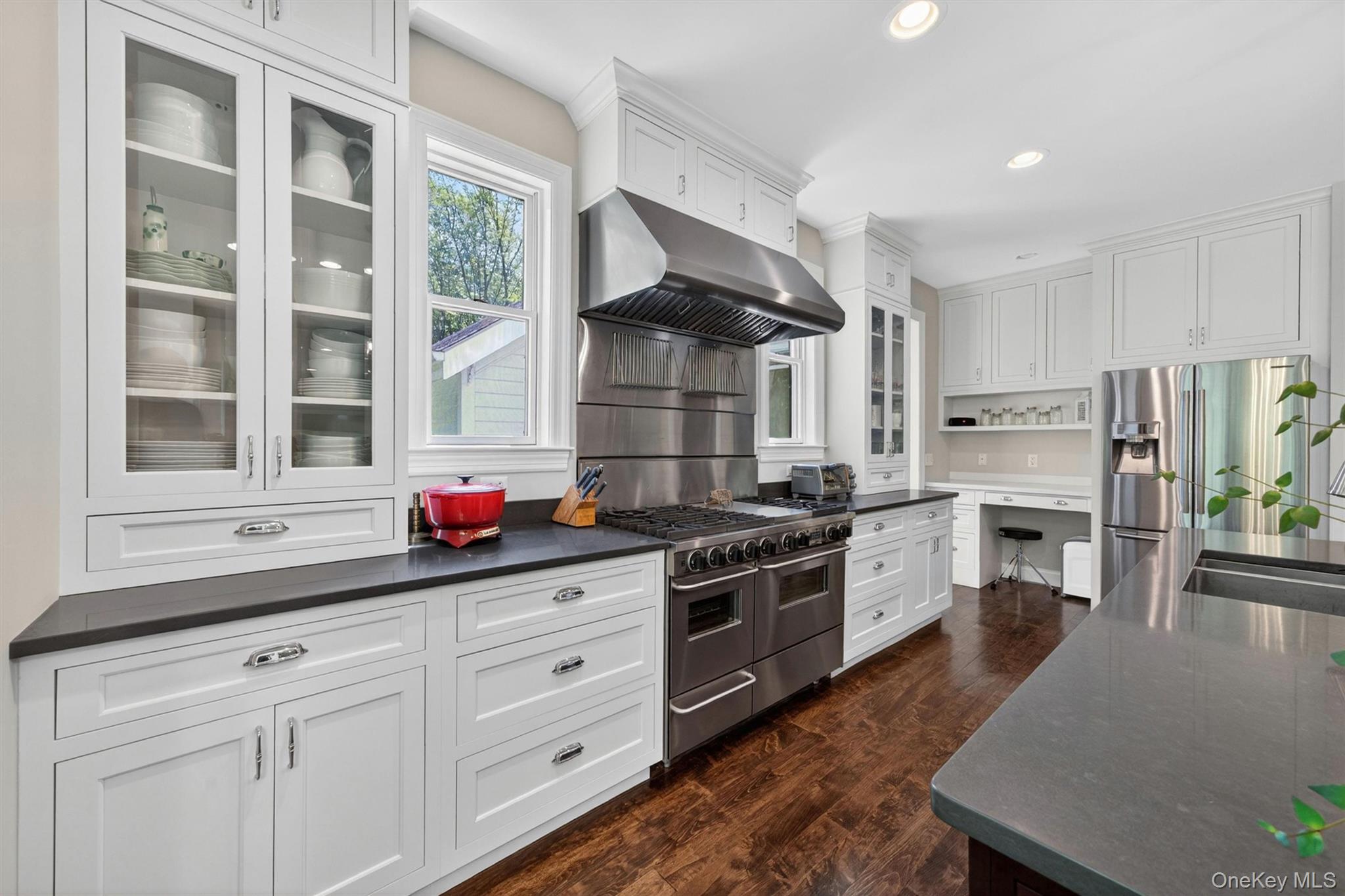 28 Bethlehem Road New Windsor, NY 12553 - Photo 20 of 50 a kitchen with stainless steel appliances white cabinets and wooden floors