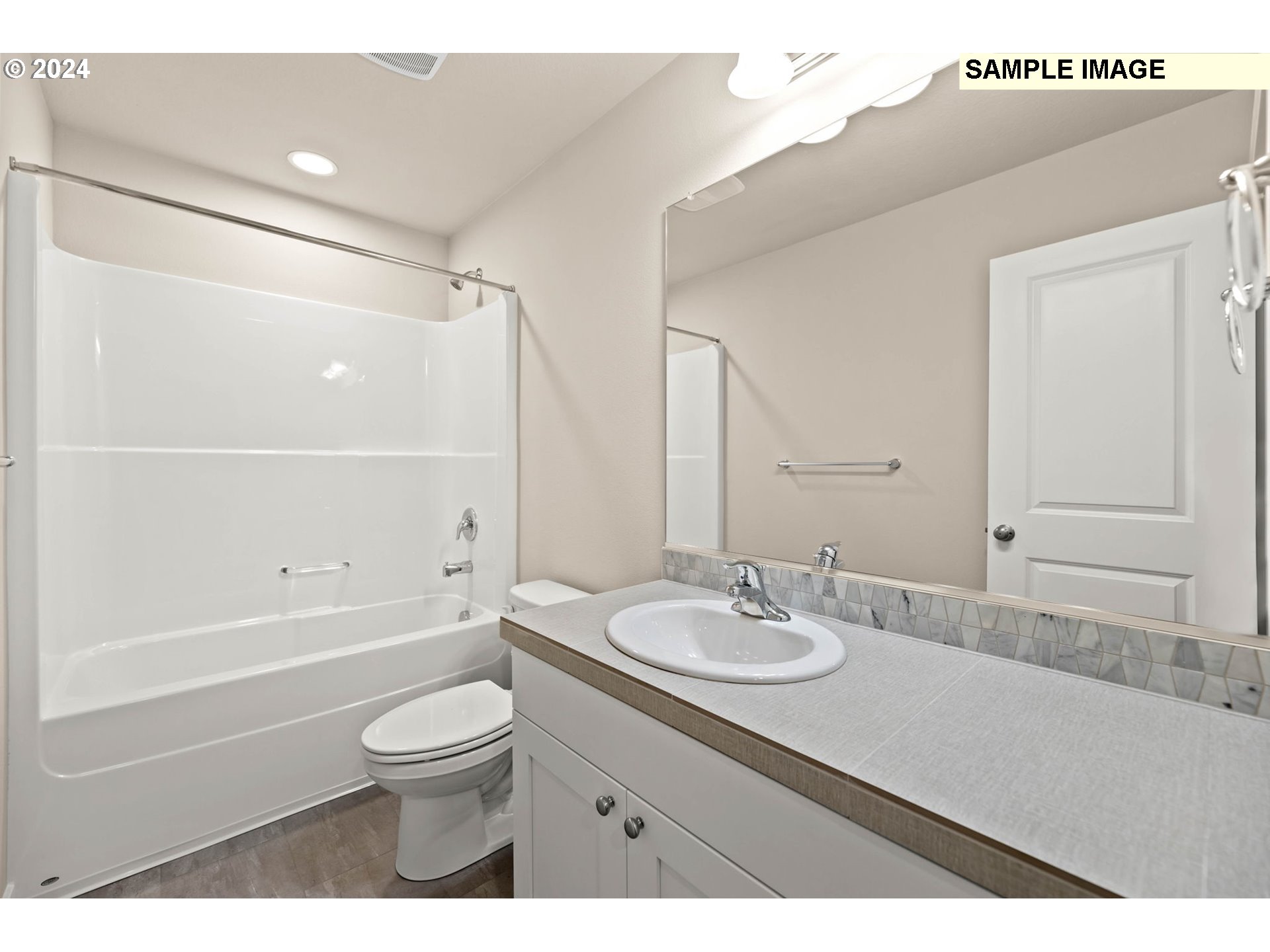 3118 South Magnolia Street, Unit LT752 Cornelius, OR 97113 - Photo 36 of 41 a bathroom with a granite countertop sink a toilet a mirror and shower