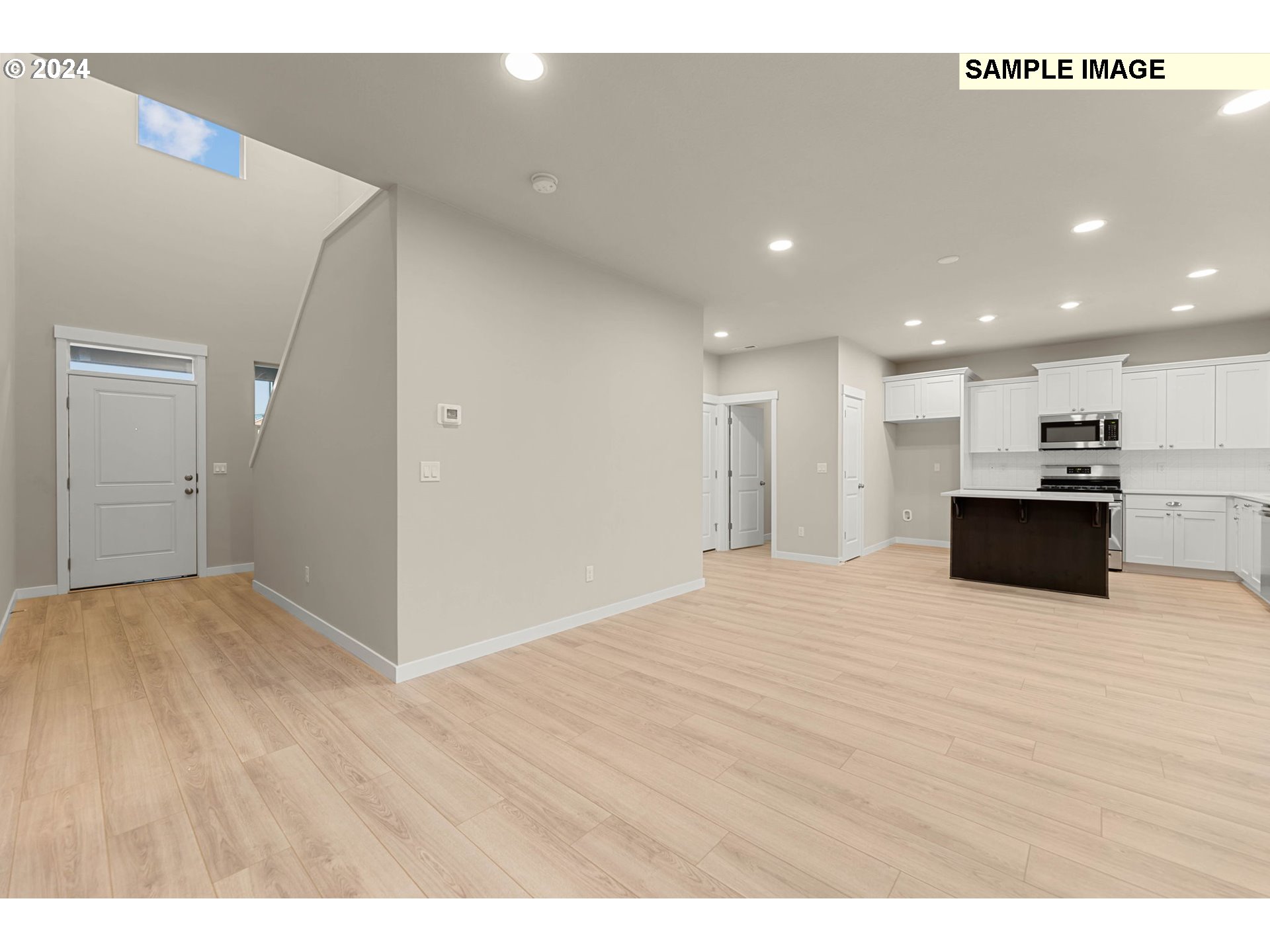 3118 South Magnolia Street, Unit LT752 Cornelius, OR 97113 - Photo 5 of 41 a view of kitchen with granite countertop cabinets and refrigerator