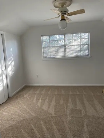 en empty room with windows