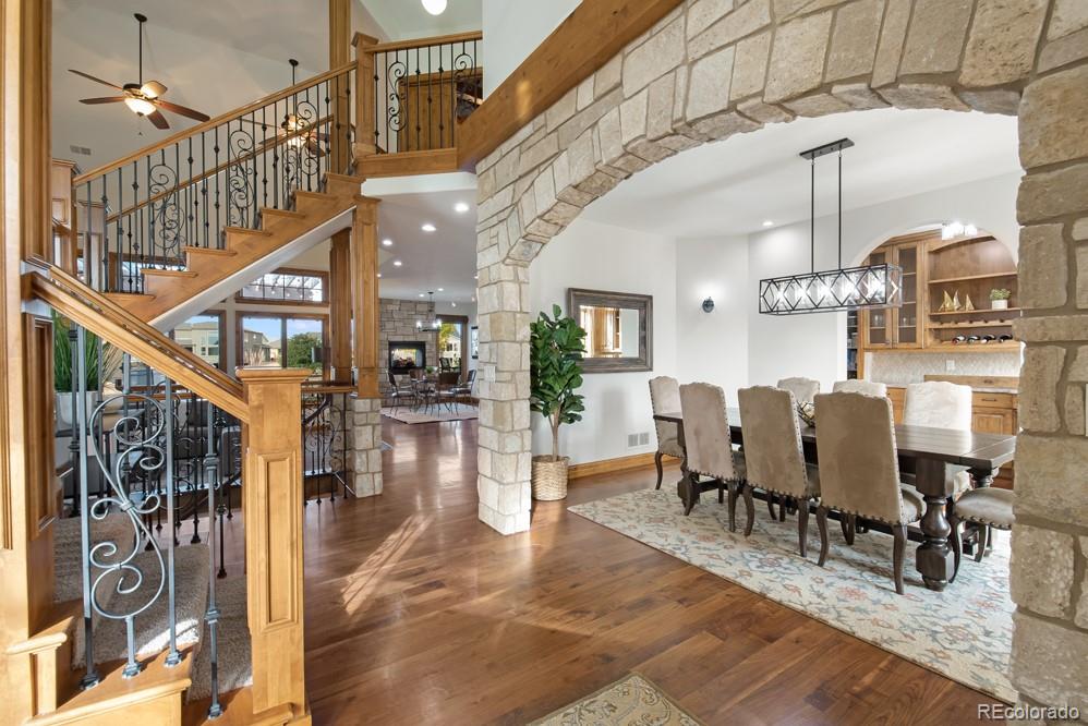 6570 Rookery Road Fort Collins, CO 80528 - Photo 5 of 40 a dining room with furniture entryway and wooden floor