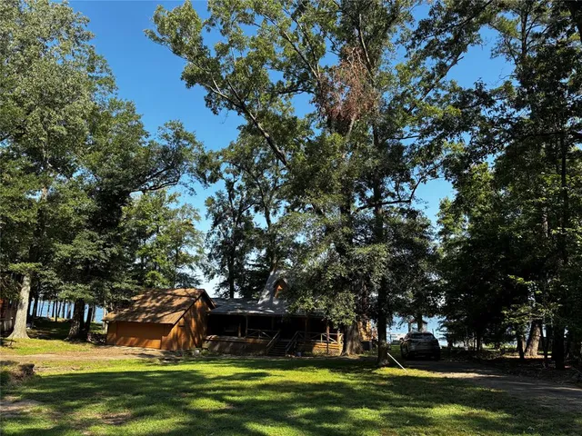 a view of a swimming pool with an outdoor space and seating area
